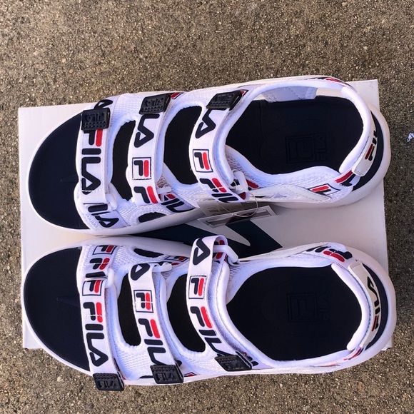 fila sandals on feet